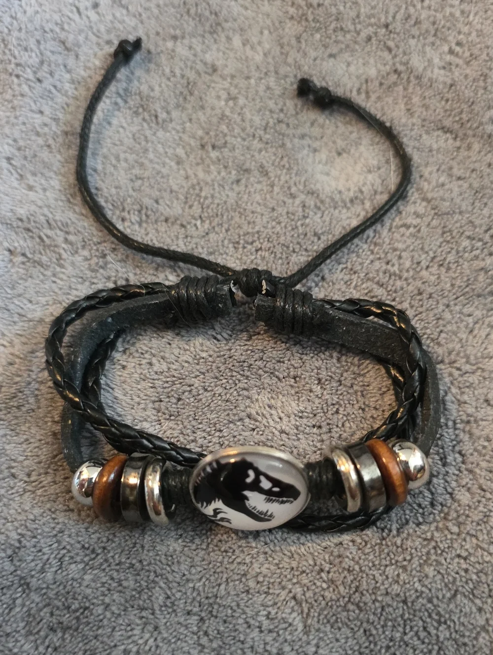 Black Leather Braided Men’s Bracelet with Dino Emblem